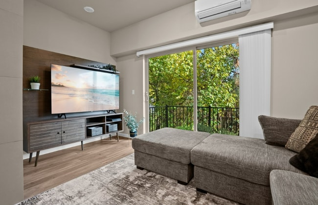 Photo - Modern 3-Bedroom Townhome-Style Home with Attached Garage, Private Patio & En-Suite Bathrooms in ...