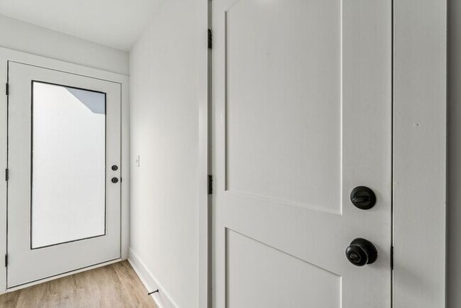 Photo - High-End 2BR Townhome | Rooftop Terrace + 2-Car Garage | 24-Unit Community