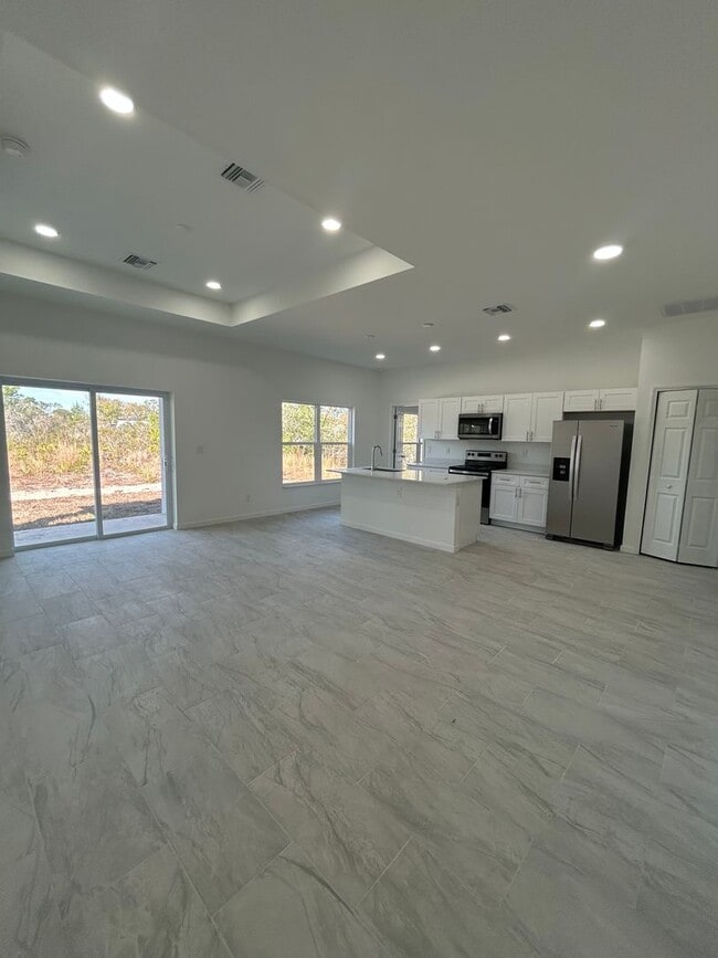 Photo - BRAND NEW Modern 4BR/2BA Home with Garage – Peaceful Lake Placid Retreat