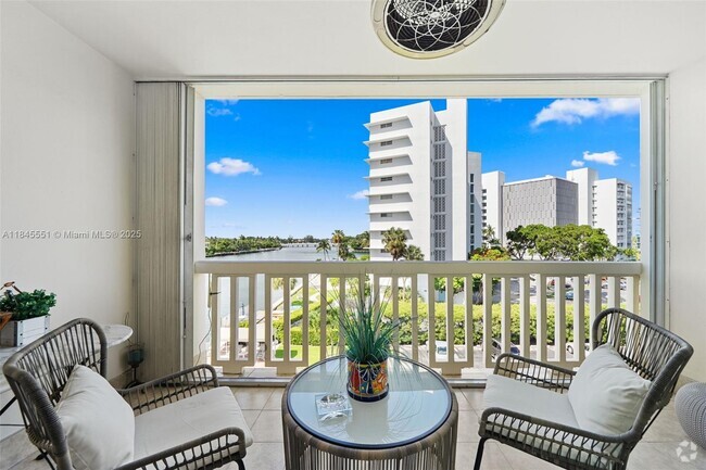 Building Photo - 9111 E Bay Harbor Dr Unit 4C Rental