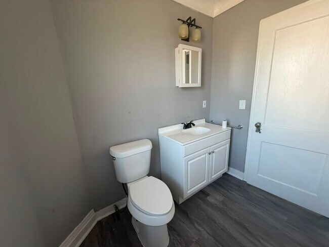 Photo - Four bedrooms. A sunroom. A fenced yard. A garage. Your next home is ready to be discovered!