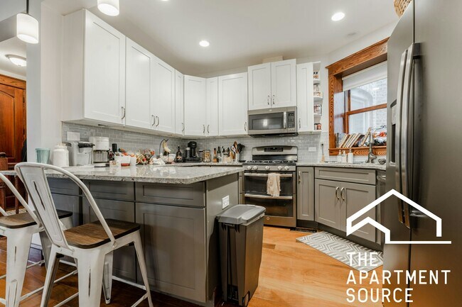 Building Photo - 1019 W Oakdale Ave Unit 1F Rental