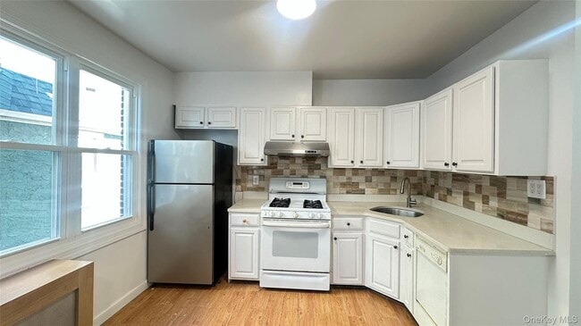 Photo - 124-06 26th Ave Unidad 1FL
