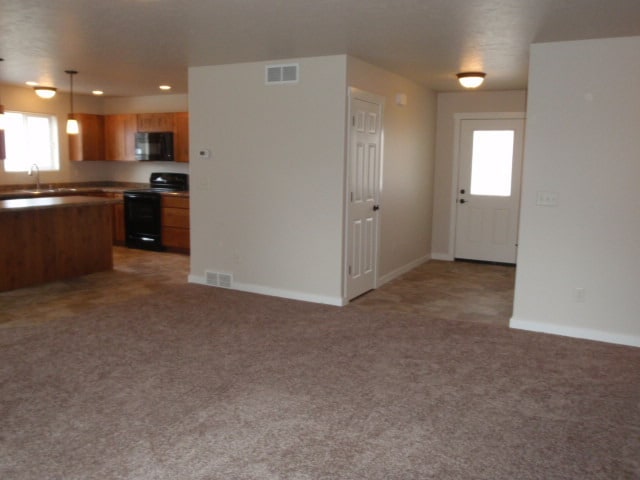 Photo - Newer house with attached garage