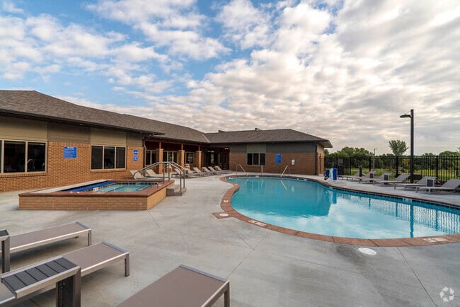 Hot days call for cool swims in our resort-style swimming pool. - 360 at Jordan West Rental