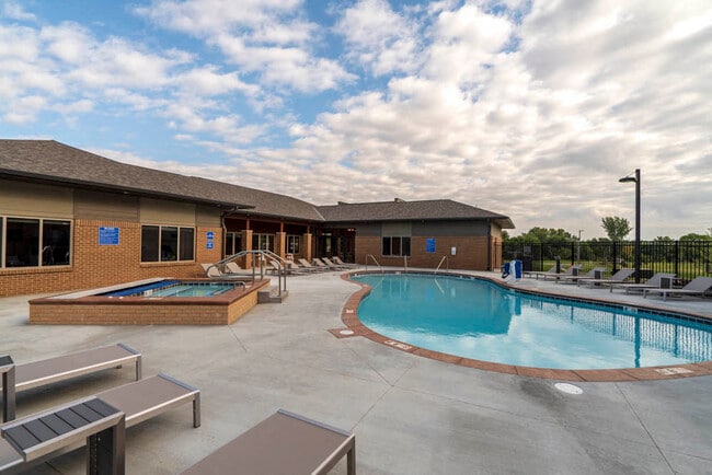 Hot days call for cool swims in our resort-style swimming pool. - 360 at Jordan West Apartments