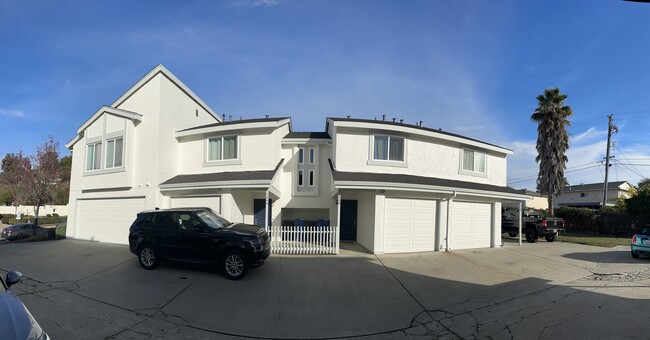 Exterior stucco, frames and front door was newly painted 12/14/2024 - 1344 Daniel Ct Townhome