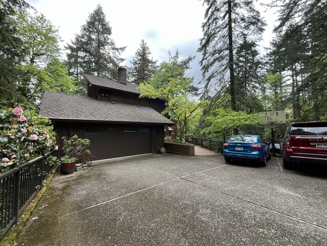 Photo - One-of-a-Kind Custom Home with Wall of Windows, Stone Fireplaces, Expansive Entertainment Space &...