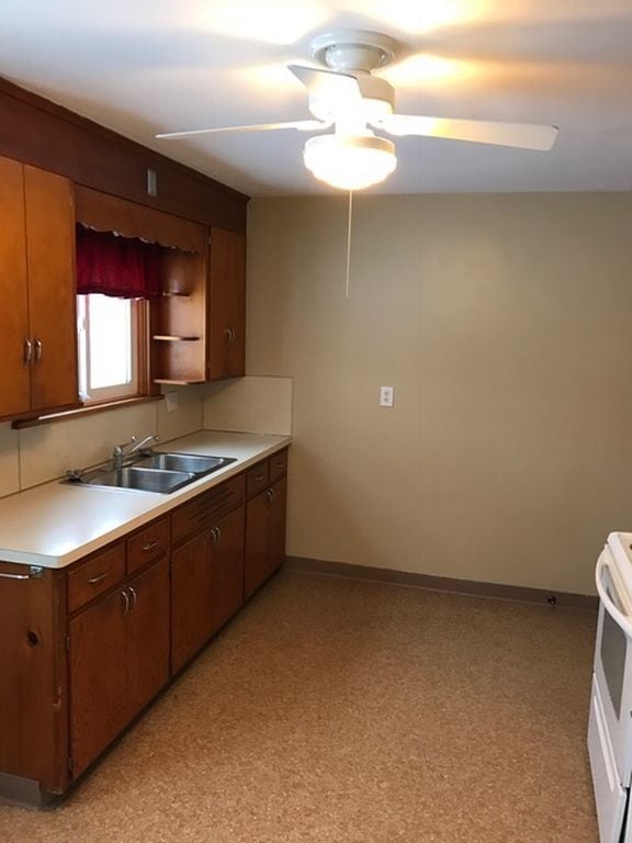 Kitchen with a view to the backyard. UPDATED KITCHEN ON THE WAY! - 60 east st