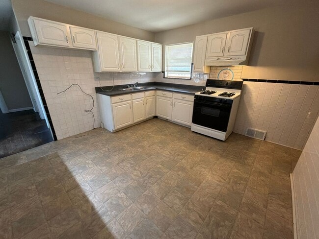Photo - Two Bedroom & 1.5 Baths, Finished Basement!