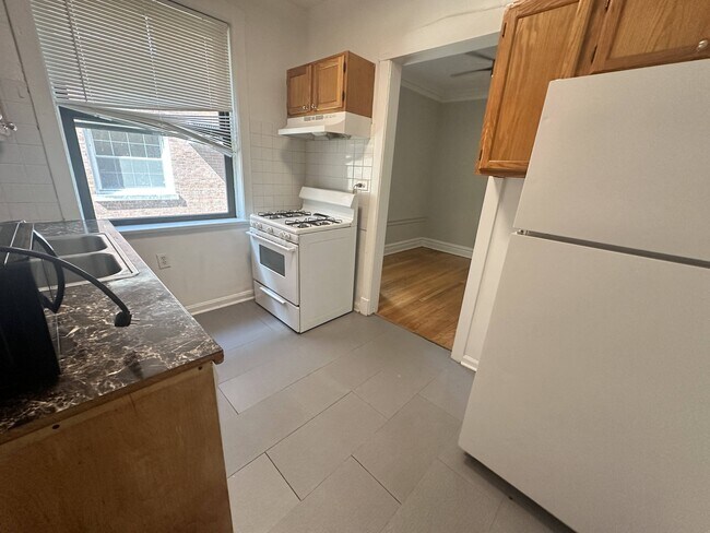 2228-38 Sherman Ave. / 803-809 Noyes St.