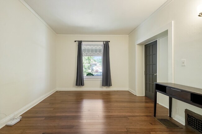 Photo - Live in Baker! Historic 2BD Home with Garage, Yard & Simplified Utilities Unit 1