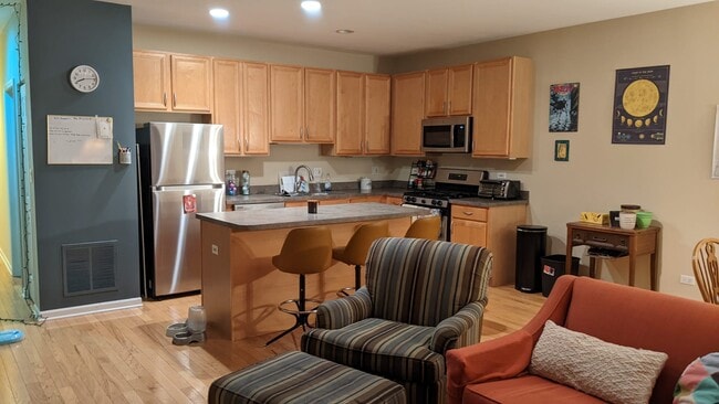 Living room facing kitchen - 1422 S Halsted St Unit 3A