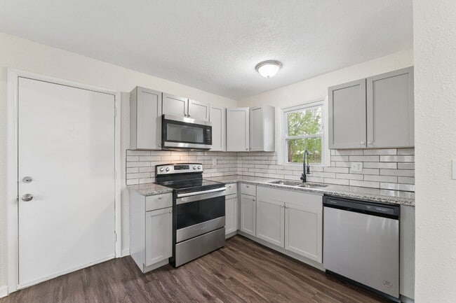 Photo - Fully Renovated 2BR/2BA + Bonus Room – Quiet Living with Spacious Backyard!  1st Month is FREE!