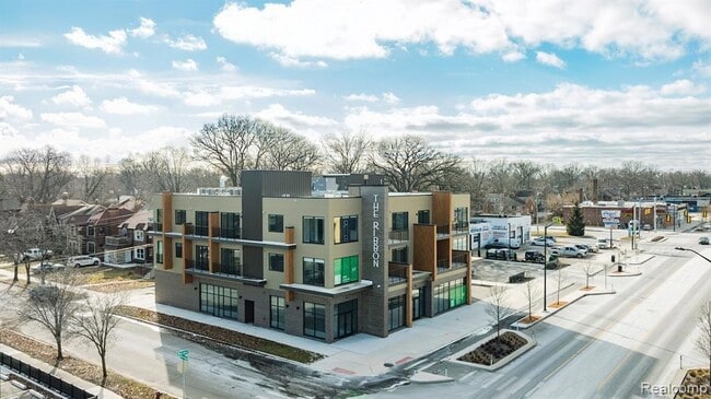 Building Photo - 16530 E Warren Ave Unit 203