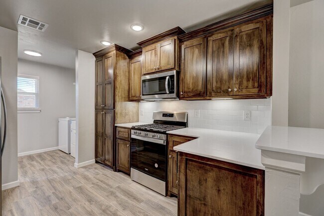 Photo - 5813 Goldfinger Rd Unit A - The Kelsi