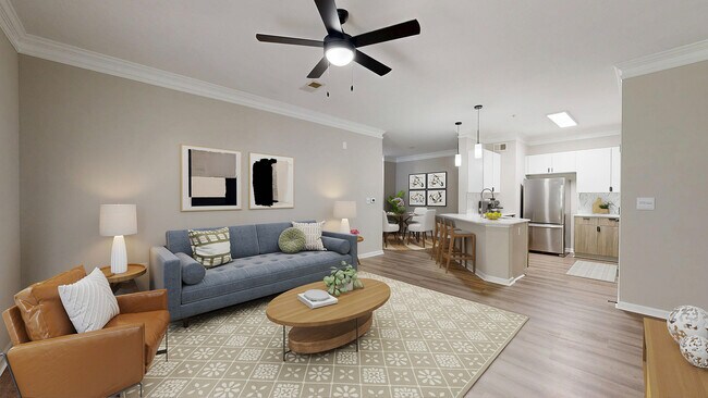 Open floor plan view featuring a large living room and kitchen. - Waterstone at Big Creek Apartments