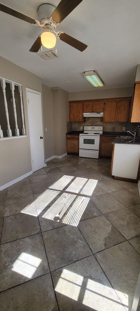 Photo - Very nice 4 bedroom/2 bath house with oven and dishwasher!