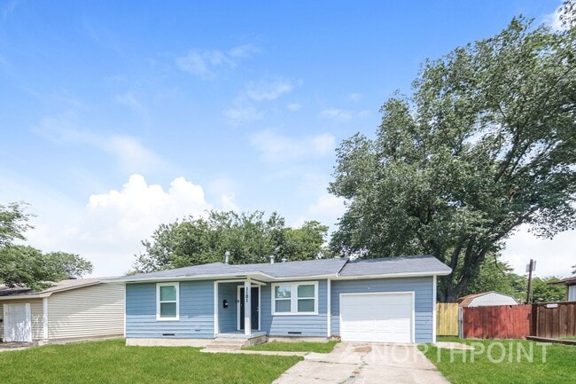 Photo - 3 BR/1BA | Newly Renovated Single Family Home | 1-Car Garage Parking | Gated backyard