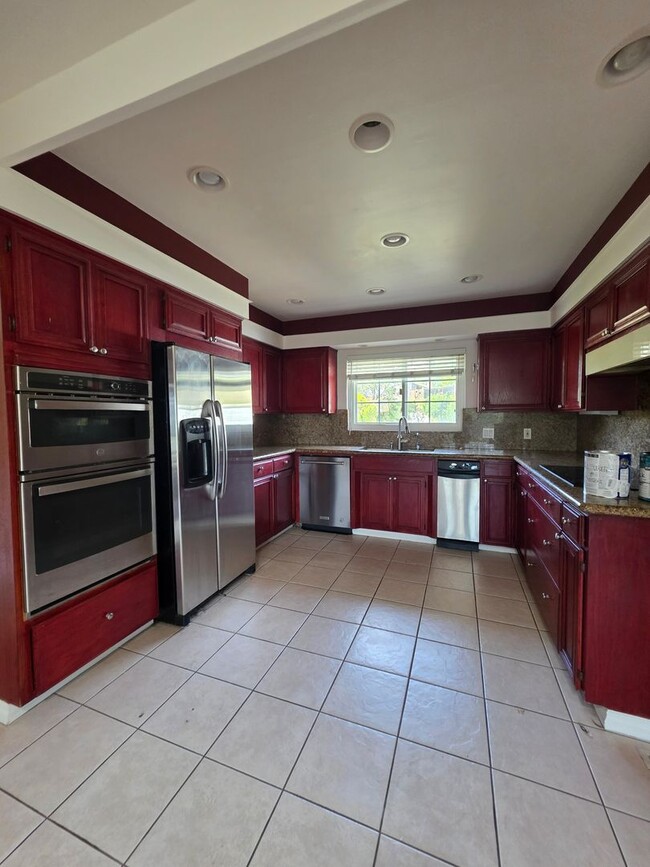 Photo - Stunning Del Cerro View Home with Spacious Split-Level Layout
