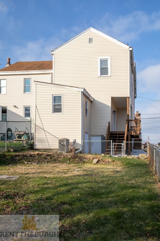 Photo - Updated 4BR House with 2 full baths and yard!