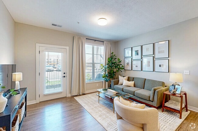1BR, 1BA - 722SF - Living Room - Carriage Park