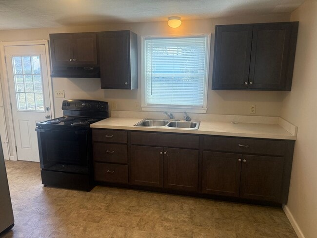 Photo - 3-4 Bedroom 1 Bath cape with garage in Liverpool Schools