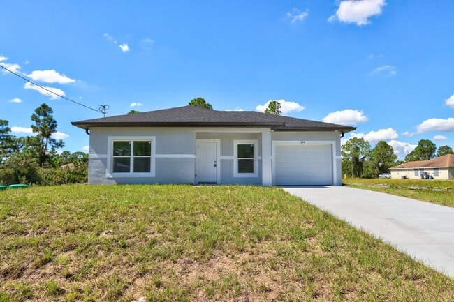 Building Photo - Brand New 2/2/1-South Lehigh Acres