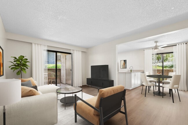 Renovated Package I living and dining room with hard surface flooring