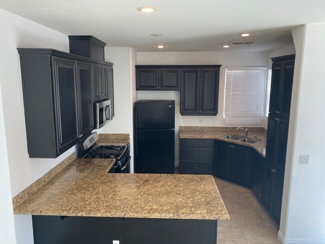 Photo - Beautiful 3Bed/3Bath/2Car corner lot home located in the guard gated Tuscany Community