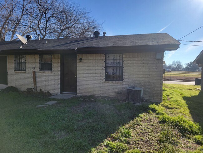 Back - 1609 N W S Young Dr