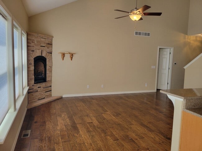 Photo - 4 Bed 3 Bath home with A/C and a gas fireplace, Available 5/8! - MileStone Real Estate Services