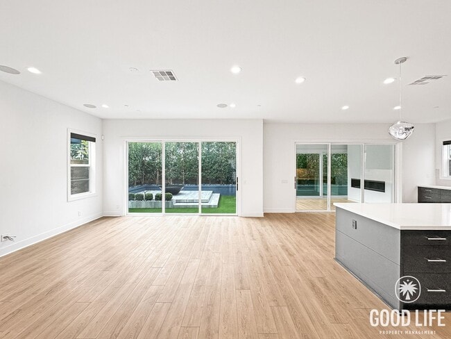 Photo - Luxury 5-Bedroom Home with Walk-In Closets, Modern Kitchen & Community Pool