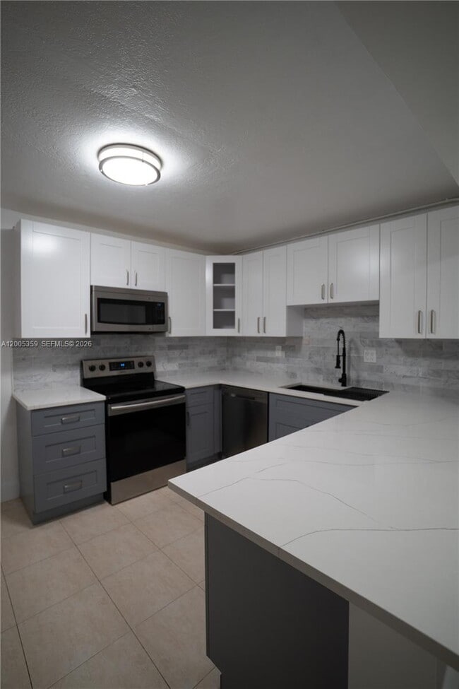 Building Photo - 6801 SW 147th Ave Unit 2D