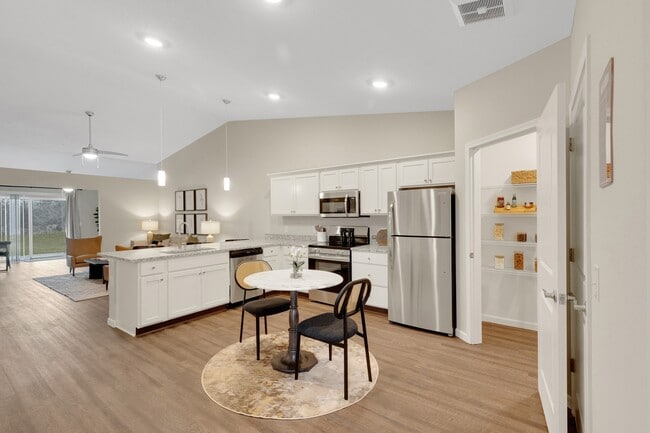 Granite Counters with Stainless Steel Fixtures and Appliances