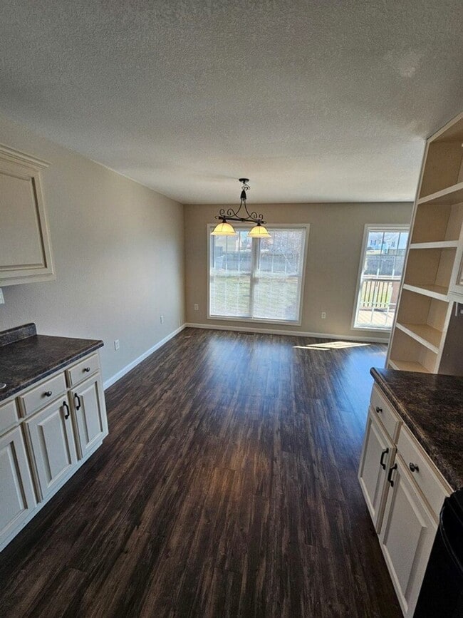 Photo - Spacious 3-Bedroom Home in Crossville with 2-Car Garage, Fenced Yard & Porches