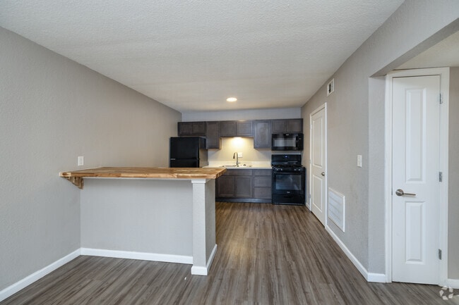 Kitchen Island with Seating Opportunity - Arbor Village Apartments