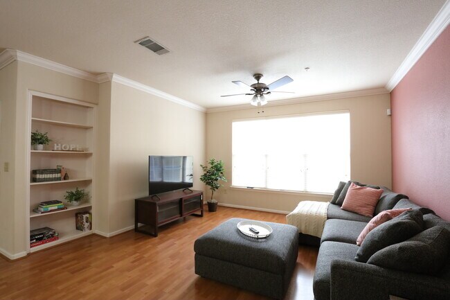 Enjoy your favorite streaming platforms on the 55" Smart TV and large sectional - 1711 Old Spanish Trl Condo