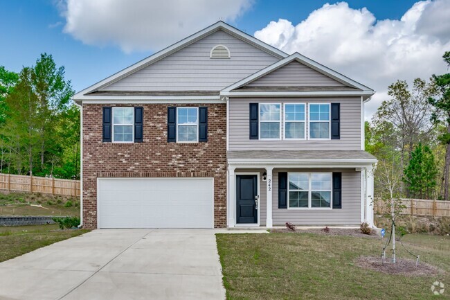 Building Photo - This home in Spring Haven is the perfect p...
