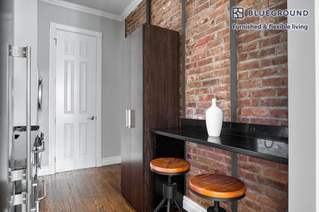 309 E 8th St Unit SI FL1-ID1115