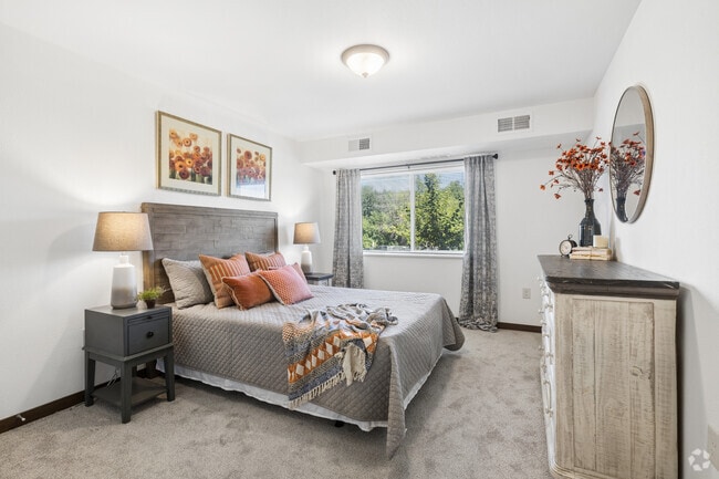 2BR, 1BA - 964SF - Primary Bedroom - Chisago Lake Apartments