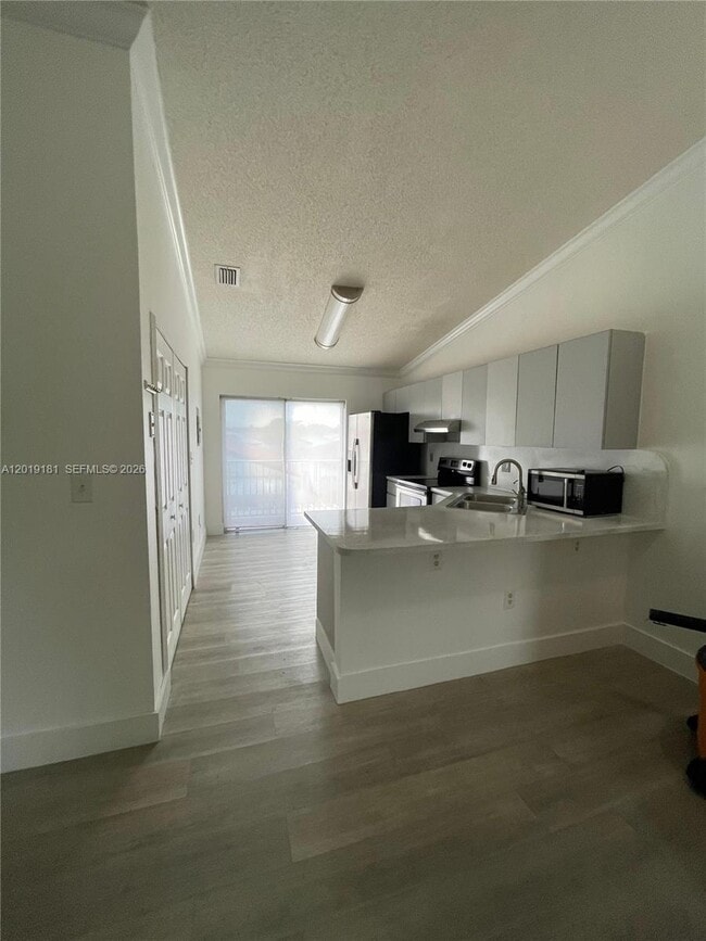 Photo - 3375 W 76th St Unit 211