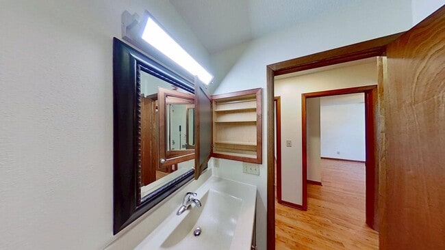Photo - Updated two bedroom duplex, new stainless steel appliances, garage, and hardwood floors