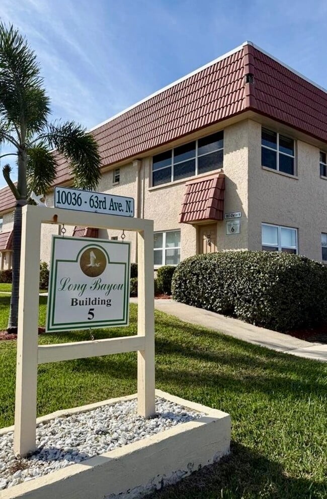 Building Photo - 10036 63rd Ave N Unit 16