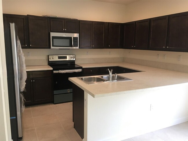 Photo - 9271 W 33rd Ln Townhome