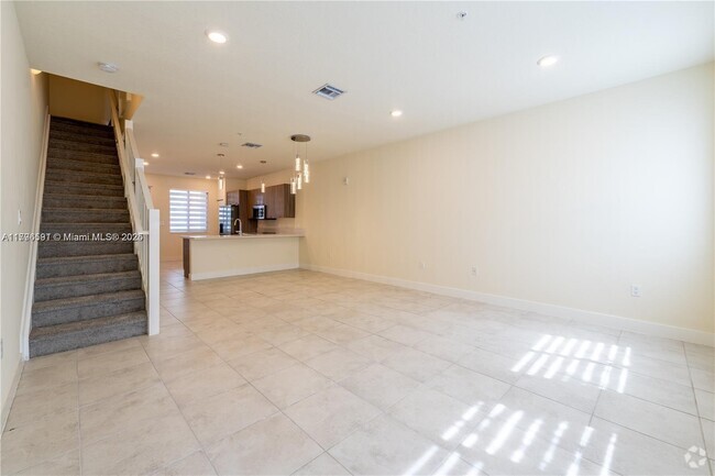 Building Photo - 6425 NW 103rd Pl Unit 107 Rental
