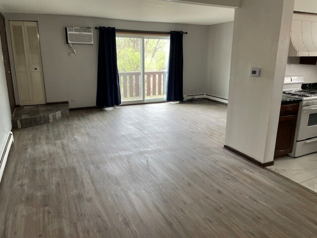 L-Shaped Living/Dining Area - 700 65th St Unit Five