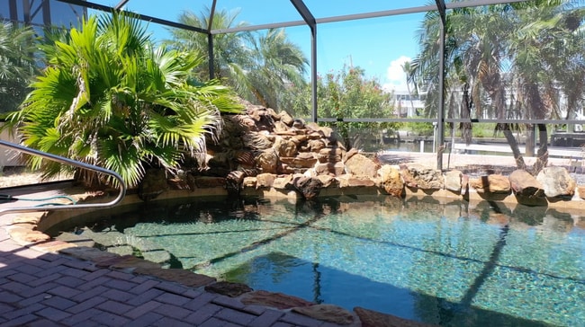 Building Photo - FT Myers Beach Amazing pool home Unit 247 Curlew St B