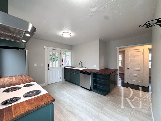 Photo - Charming Upper Unit with Modern Kitchen, W...