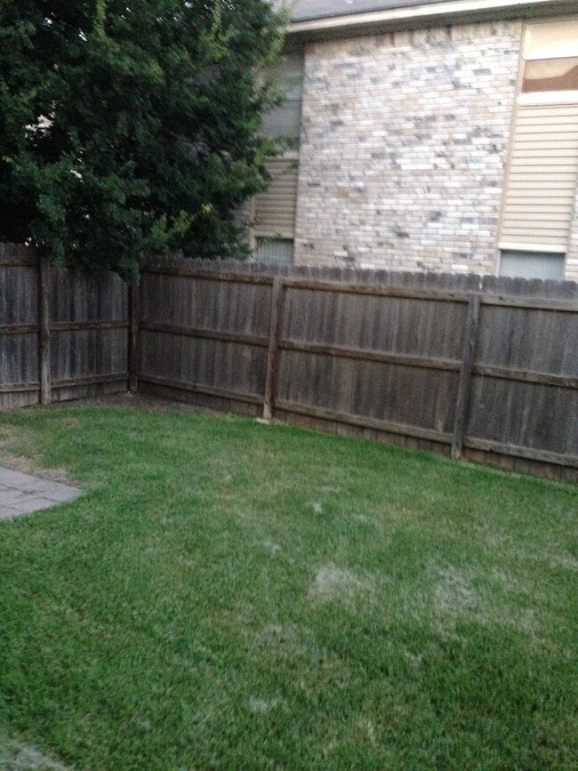 Photo - A FOURPLEX ON THE SHUTTLE ROUTE WITH PRIVACY FENCED YARD!!!